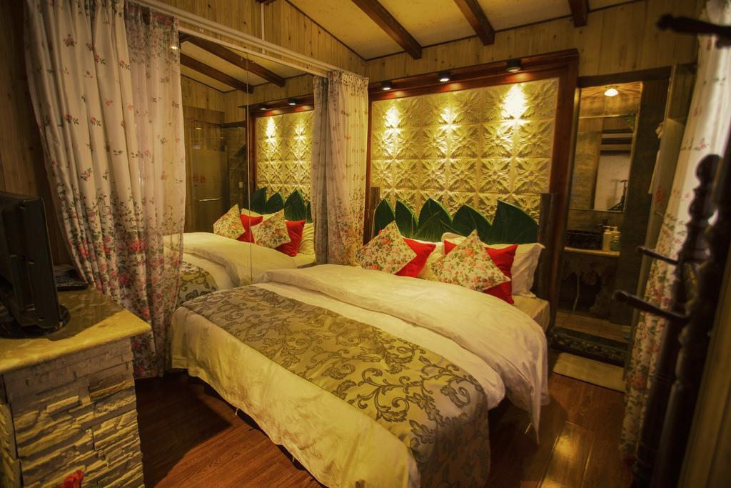 Secret Garden Hotell Lijiang  Rum bild
