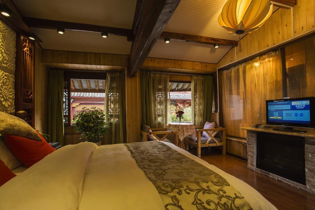 Secret Garden Hotell Lijiang  Rum bild