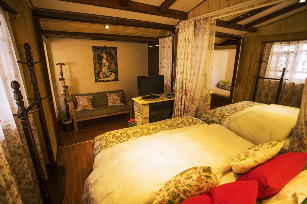 Secret Garden Hotell Lijiang  Rum bild