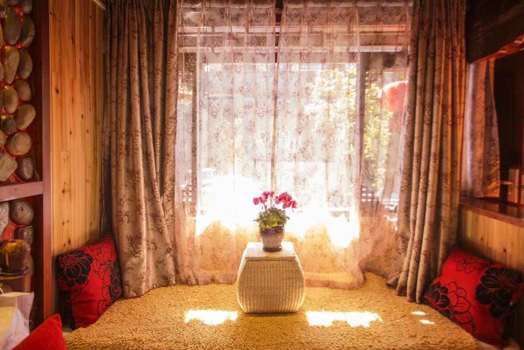 Secret Garden Hotell Lijiang  Rum bild
