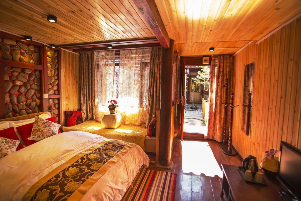 Secret Garden Hotell Lijiang  Rum bild