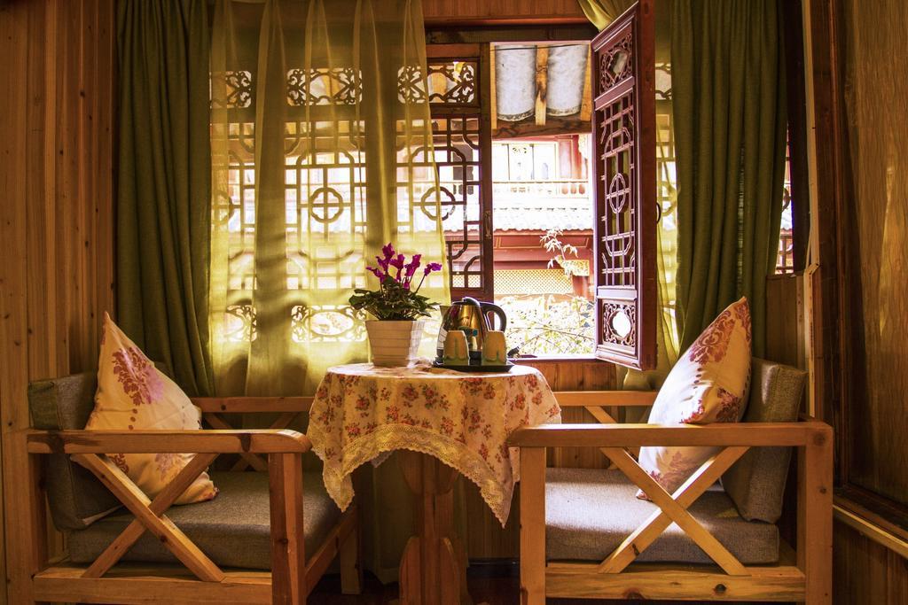 Secret Garden Hotell Lijiang  Rum bild