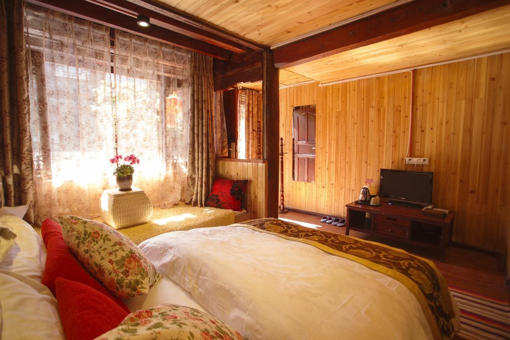 Secret Garden Hotell Lijiang  Rum bild
